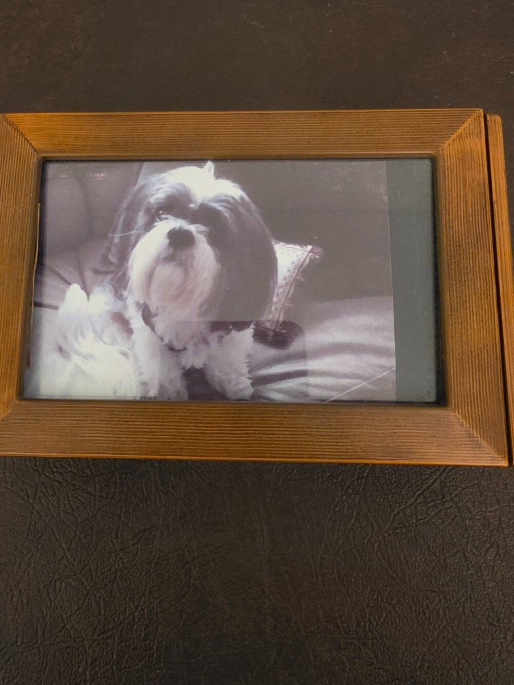 Vintage wooden jewelry box with a picture frame features a rectangular shape